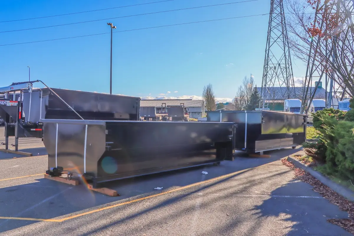 Roll-off dumpster ready for waste disposal at job site for 3 Yard Dumpster Rental in Haddon Heights